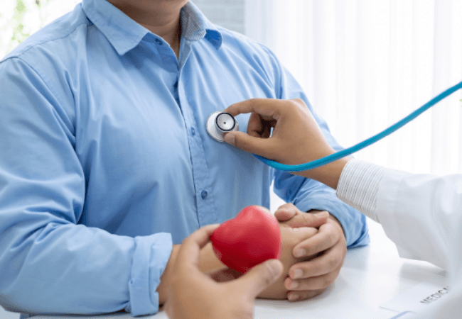 Cardiologist with patient